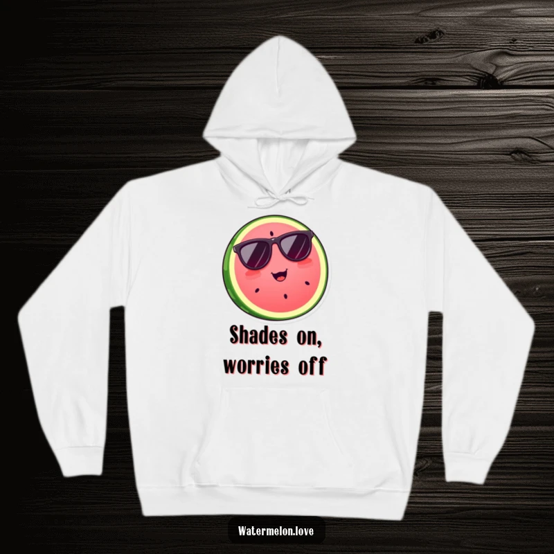 Funny watermelon slice sporting cool sunglasses, featured on a warm hoodie, a stylish and humorous gift.